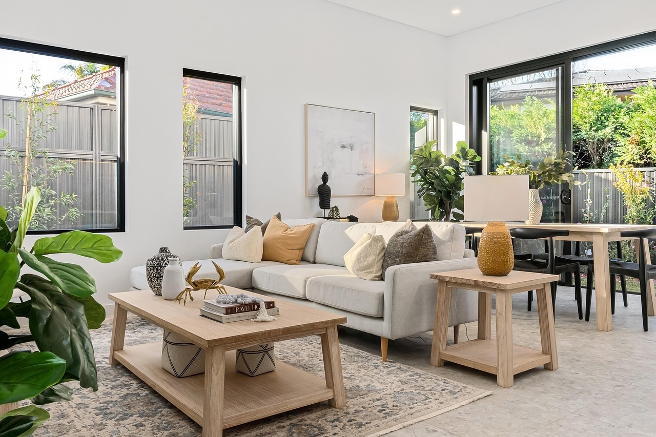 living room, sofa, center table, side table, coffee table, pillows, dining table, dining chairs, table, chair, white wall, interior, modern, luxury, wall decor, wall art, wood, design, floor, indoor plants, glass, sliding door, windows, real estate